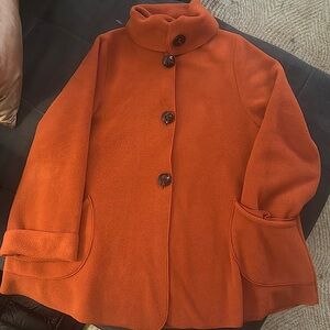 Classic fleece swing coat with stylish details.